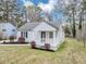 Well-maintained house featuring a lovely porch and fresh landscaping at 1991 Mcafee Pl, Decatur, GA 30032