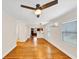 View of living room leads into a kitchen with hardwood floors throughout at 1991 Mcafee Pl, Decatur, GA 30032