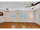 Spacious room with hardwood floors, neutral walls, and a ceiling fan at 1991 Mcafee Pl, Decatur, GA 30032