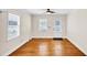 Bright and airy living room with hardwood floors and a view of the back entrance at 1991 Mcafee Pl, Decatur, GA 30032