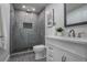 Modern bathroom features a glass enclosed shower with tiled walls and a floating vanity at 2041 Briarcliff Ne Rd, Atlanta, GA 30329