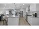 A gourmet kitchen with granite countertops, stainless steel appliances, a breakfast bar, and ample storage space at 2041 Briarcliff Ne Rd, Atlanta, GA 30329