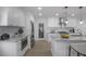 Bright kitchen features white cabinets, stainless steel appliances and granite countertops at 2041 Briarcliff Ne Rd, Atlanta, GA 30329