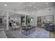 Inviting living room showcasing an open layout, contemporary decor, stylish furnishings, and views into the kitchen and bedroom at 2041 Briarcliff Ne Rd, Atlanta, GA 30329