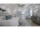 Spacious main bedroom boasts a tray ceiling, modern decor, and ensuite bathroom at 2041 Briarcliff Ne Rd, Atlanta, GA 30329