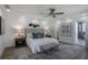 This main bedroom includes a tray ceiling, modern decor, and an ensuite bathroom at 2041 Briarcliff Ne Rd, Atlanta, GA 30329