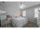 Bright bedroom featuring natural light, a decorative wall, and modern furniture at 725 Glengary Ne Way, Atlanta, GA 30342