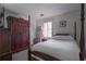 Spacious bedroom featuring neutral walls, a bed frame, and ample natural light at 725 Glengary Ne Way, Atlanta, GA 30342