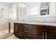 Bathroom with double vanity, granite countertop, glass enclosed shower, and tile floors at 3371 Dogwood Dr # 220, Hapeville, GA 30354