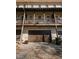 Townhome back elevation with multiple garages and balconies off the back at 3371 Dogwood Dr # 220, Hapeville, GA 30354