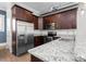 Charming kitchen featuring stainless steel appliances, granite counters, and plentiful cabinet space for storage and functionality at 3371 Dogwood Dr # 220, Hapeville, GA 30354