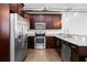 Kitchen with stainless steel appliances, granite countertops, ample cabinet space, and convenient layout with open-concept design at 3371 Dogwood Dr # 220, Hapeville, GA 30354