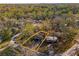 Aerial image highlighting the property lines of a home within a lush, green neighborhood at 2382 Whites Mill Ln, Decatur, GA 30032