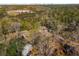 Aerial view of property showcasing its location amidst a lush, wooded neighborhood at 2382 Whites Mill Ln, Decatur, GA 30032