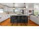 Bright kitchen with a central island, white cabinets, stainless steel appliances, and an open layout at 2382 Whites Mill Ln, Decatur, GA 30032