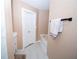 Light-filled bathroom showcases modern cabinetry, fixtures, and ample space and natural light at 5740 Terremont Cir, Norcross, GA 30093