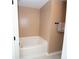 Bright bathroom featuring a soaking tub, neutral paint and white trim at 5740 Terremont Cir, Norcross, GA 30093