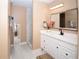 Bright bathroom featuring a spacious shower, modern vanity and fixtures, and neutral paint at 5740 Terremont Cir, Norcross, GA 30093