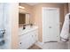 Charming bathroom showcasing a shower, vanity with modern fixtures, and updated finishes at 5740 Terremont Cir, Norcross, GA 30093