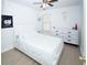 Clean bedroom with a ceiling fan, hardwood floors, and a window for lots of sunlight at 5740 Terremont Cir, Norcross, GA 30093
