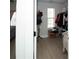 Walk-in closet featuring built-in shelving, hanging racks, and ample storage space at 5740 Terremont Cir, Norcross, GA 30093