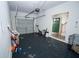 Clean garage with neutral paint and an entryway into the home at 5740 Terremont Cir, Norcross, GA 30093