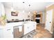 Modern kitchen with white cabinets, stainless steel appliances, and an island at 5740 Terremont Cir, Norcross, GA 30093