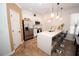 Open-concept kitchen featuring stainless steel appliances and a large island with bar stool seating at 5740 Terremont Cir, Norcross, GA 30093