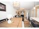 Inviting dining area that adjoins the modern open-concept living room and kitchen at 5740 Terremont Cir, Norcross, GA 30093
