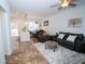 Open-concept living room featuring modern tile flooring and a contemporary design at 5740 Terremont Cir, Norcross, GA 30093