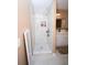 Newly remodeled shower featuring tiled walls, rain shower head and built in shelves at 5740 Terremont Cir, Norcross, GA 30093