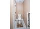 Cozy half-bathroom with tile floors and neutral paint tones at 5740 Terremont Cir, Norcross, GA 30093