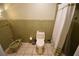 Bathroom showcasing the toilet, bidet, and tilework at 1075 Winding Branch Ln, Atlanta, GA 30338