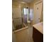 Bathroom featuring tile flooring and walk-in shower at 1075 Winding Branch Ln, Atlanta, GA 30338