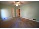 Bedroom with ceiling fan and two doors at 1075 Winding Branch Ln, Atlanta, GA 30338