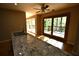 Kitchen counter overlooks breakfast nook and sliding doors to deck at 1075 Winding Branch Ln, Atlanta, GA 30338