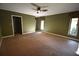 Generous main bedroom with large windows providing ample natural light at 1075 Winding Branch Ln, Atlanta, GA 30338