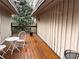 Covered porch with a cozy seating area, perfect for relaxing outdoors at 1075 Winding Branch Ln, Atlanta, GA 30338