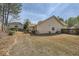 Spacious backyard featuring lawn and landscaping at 1312 Birch Ct, Lithonia, GA 30058