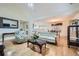 Open concept living room with hardwood floors and vaulted ceilings at 1312 Birch Ct, Lithonia, GA 30058