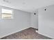 Bright basement area with tiled floor and a window at 1328 Sharon Street Nw, Atlanta, GA 30314