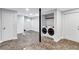 Spacious basement area with laundry hookups, durable flooring, and ample storage or renovation potential at 1328 Sharon Street Nw, Atlanta, GA 30314