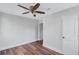Comfortable bedroom boasting hardwood floors, neutral paint, a ceiling fan, and a closet at 1328 Sharon Street Nw, Atlanta, GA 30314