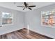 Sunlit bedroom with hardwood floors, ceiling fan and bright windows at 1328 Sharon Street Nw, Atlanta, GA 30314