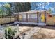 Charming front porch view of this lovely duplex featuring yellow doors and walkway at 1328 Sharon Street Nw, Atlanta, GA 30314