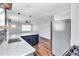 Modern kitchen featuring stainless steel appliances, an island, and white countertops at 1328 Sharon Street Nw, Atlanta, GA 30314