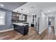 Bright kitchen with modern appliances, beautiful countertops, and wood-look flooring at 1328 Sharon Street Nw, Atlanta, GA 30314