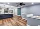 Spacious living area with modern kitchen, sleek flooring and ample natural light at 1328 Sharon Street Nw, Atlanta, GA 30314