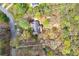 Aerial view of the home showcasing the surrounding treed lot at 195 Creekside Way, Mcdonough, GA 30252