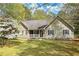 Charming home with a large front yard at 195 Creekside Way, Mcdonough, GA 30252